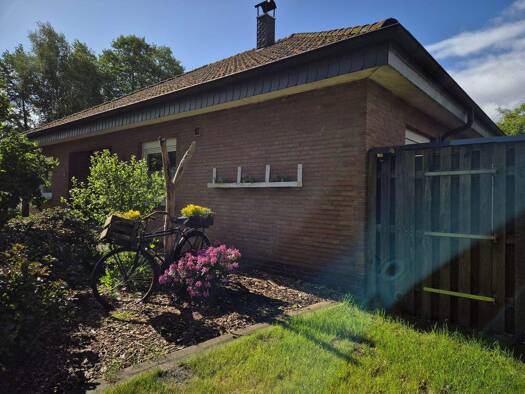 Bungalow zum Kauf 329.000 € 4 Zimmer 134 m² 1.217 m² Grundstück Barßel 26676