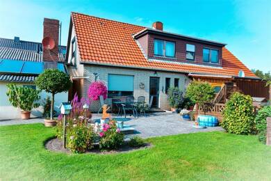 Einfamilienhaus zum Kauf 375.000 € 6 Zimmer 160 m² 7.465 m² Grundstück Midlum Wurster Nordseeküste 27637