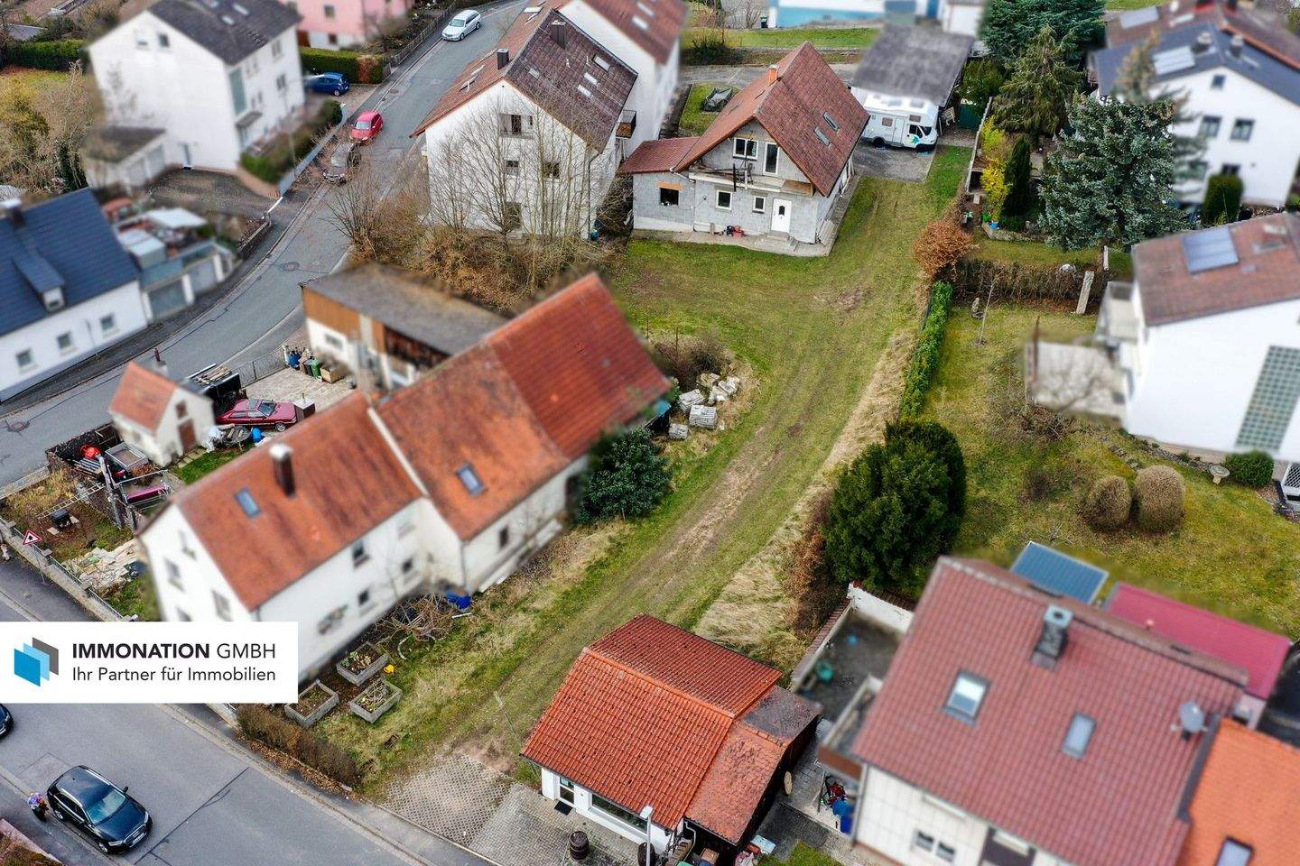 Immobilie in Stegaurach - IMMONATION! Dreifamilienhaus mit Gewerbeeinheit in Stegaurach - Bild 1