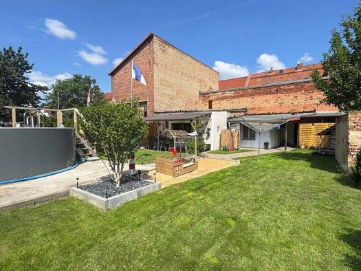 Mehrfamilienhaus zum Kauf 275.000 € 7 Zimmer 149,3 m² 548 m² Grundstück Roßlau 06862