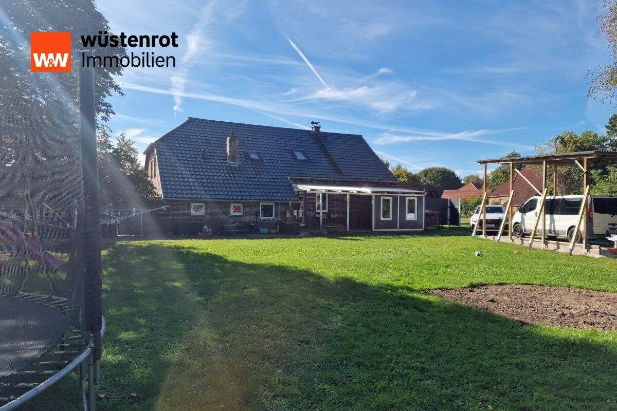 Immobilie in Großefehn - Modernisiertes Landhaus mit Einliegerwohnung in schönen Großefehn - Bild 0