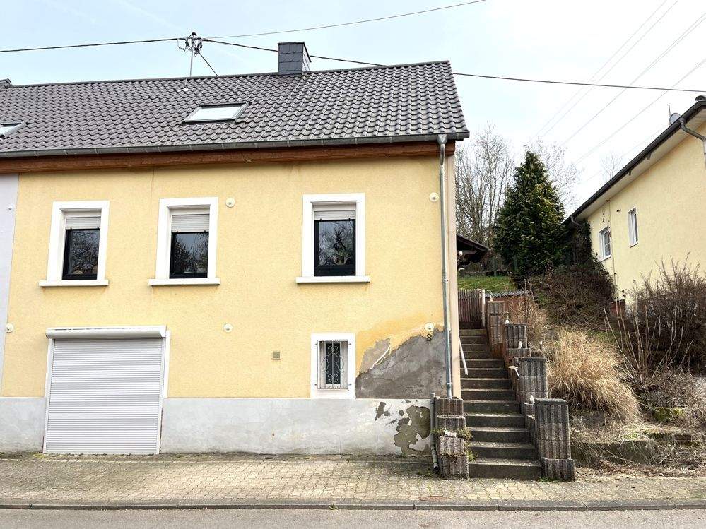 Immobilie in Schiffweiler - Klein, charmant und mit großer Terrasse- Ihr neues Zuhause in Schiffweiler - Bild 1