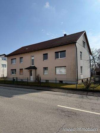 Immobilie in Garching an der Alz - Gepflegte 3-Zimmer-Erdgeschosswohnung mit Loggia, Garage und großem Kellerraum in Garching an der Alz - Hartfeld - Bild 1