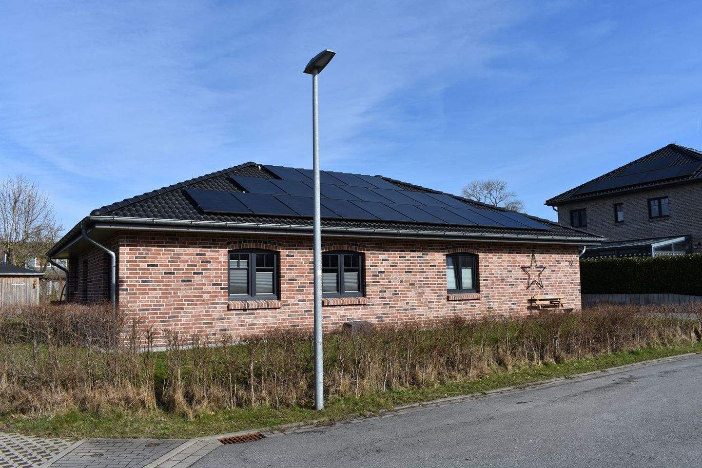 Immobilie in Bohmstedt - Neuwertiger Winkelbungalow in ruhiger Wohnlage - Bild 1