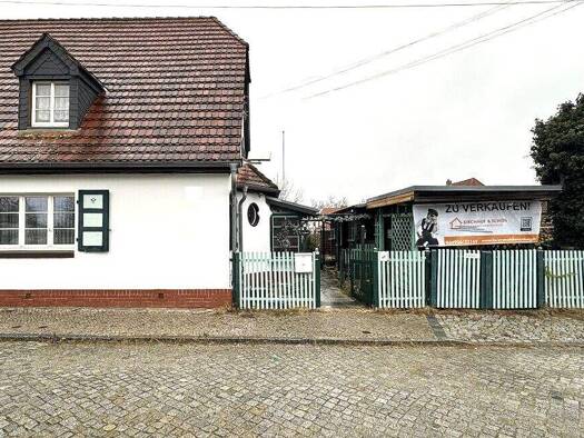 Doppelhaushälfte zum Kauf 98.000 € 5 Zimmer 103 m² 512 m² Grundstück Wolfen 06766