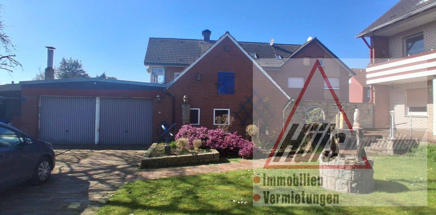 Immobilie in Lienen - Attraktives Dreifamilienhaus mit großem Südgarten und vielen Möglichkeiten - Bild 2