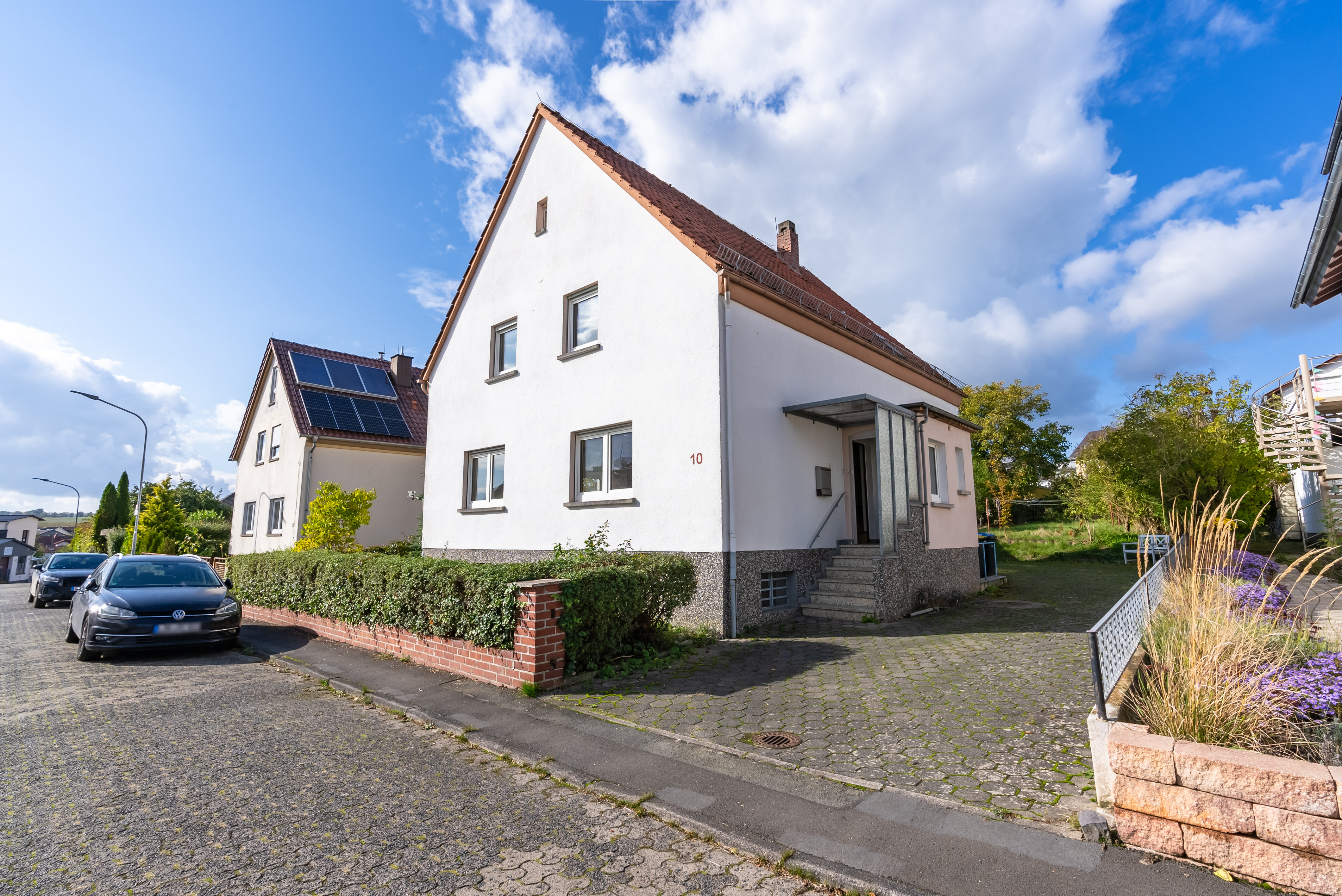 Einfamilienhaus zum Kauf 295.000 € 6 Zimmer 147 m²<br/>Wohnfläche 891 m²<br/>Grundstück Volpertshausen Hüttenberg 35625