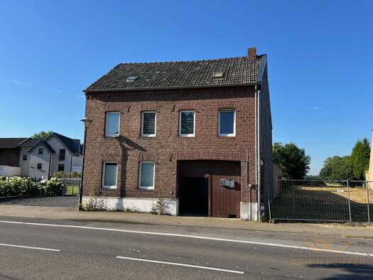 Mehrfamilienhaus zum Kauf 195.000 € 6 Zimmer 156,7 m² 1.193 m² Grundstück Millich Hückelhoven 41836
