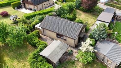 Bungalow zum Kauf 85.000 € 2 Zimmer 56 m² 712 m² Grundstück frei ab sofort Zeisigweg 3 Nienhagen Moringen 37186
