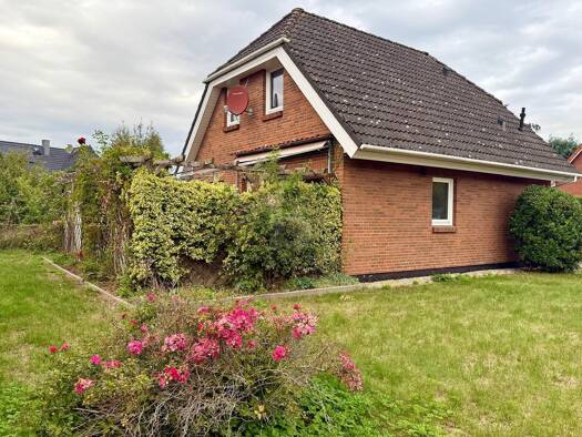 Einfamilienhaus zum Kauf 550.000 € 3 Zimmer 110 m² 879 m² Grundstück Pönitz Scharbeutz 23684