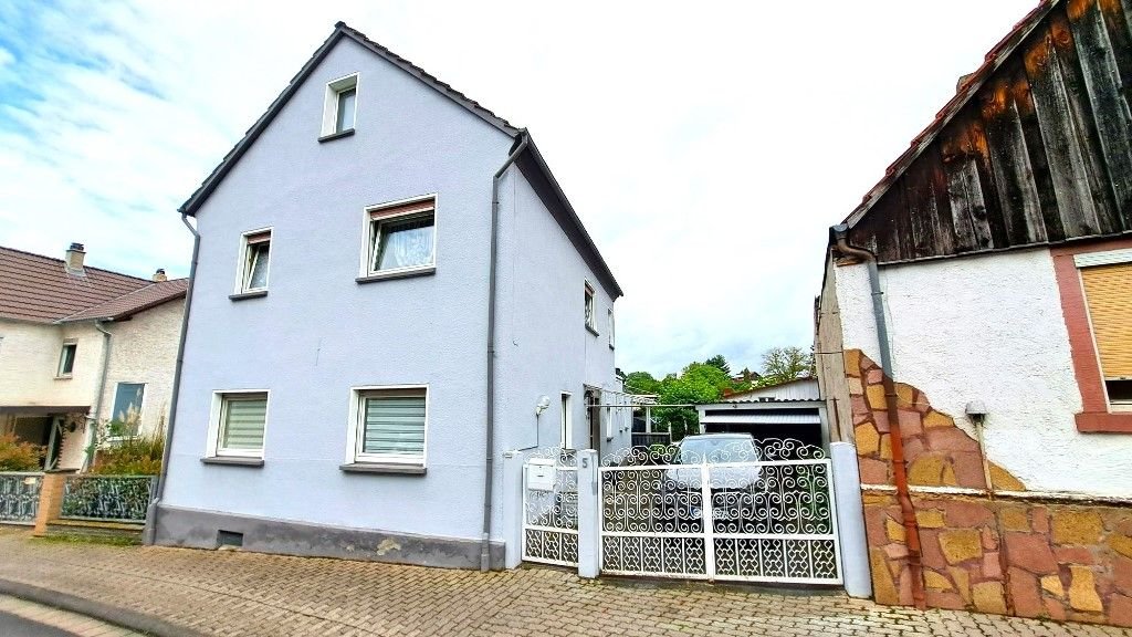 Einfamilienhaus zum Kauf 299.000 € 4 Zimmer 145 m²<br/>Wohnfläche 463 m²<br/>Grundstück Rüdigheim Neuberg 63543