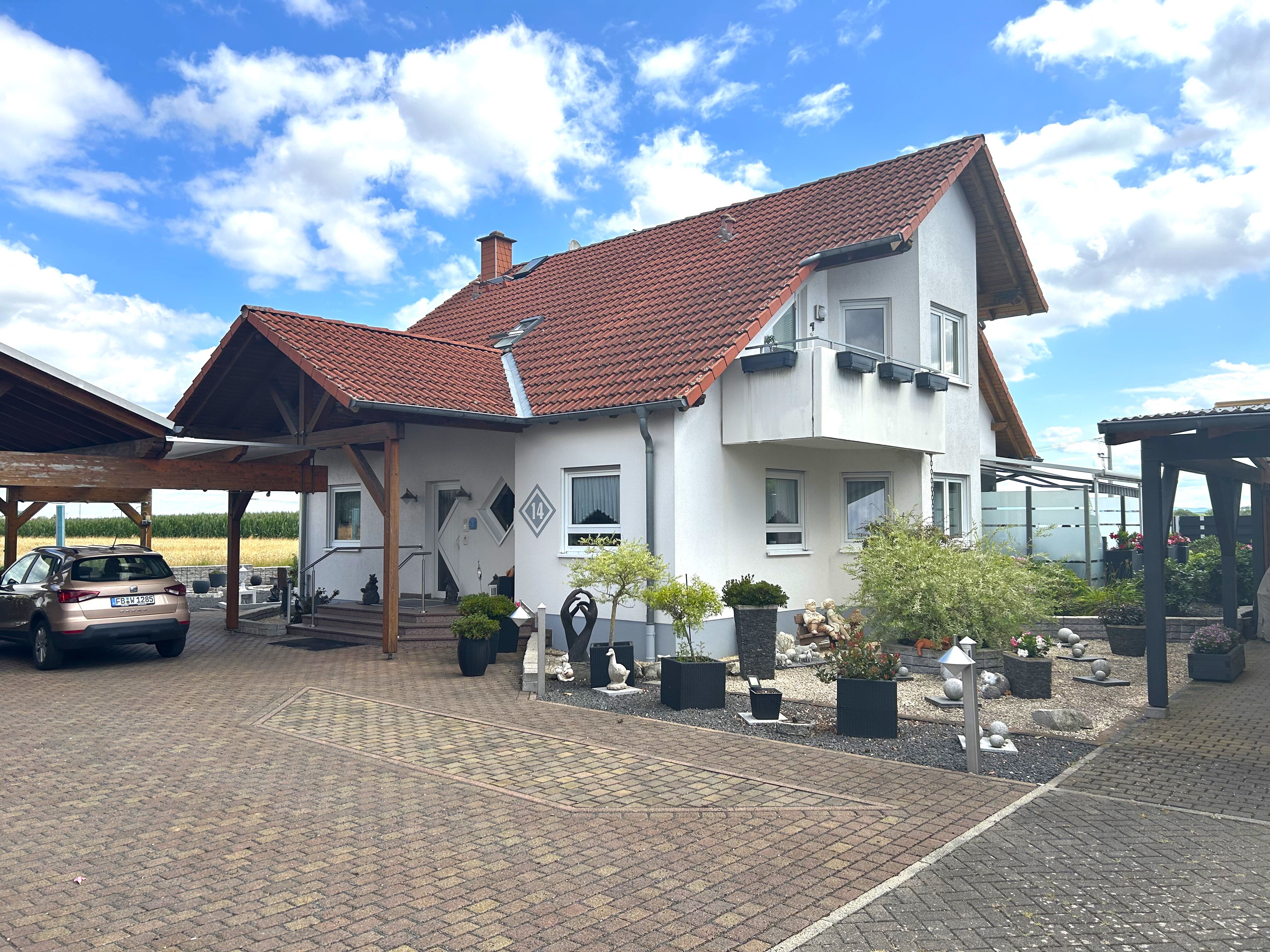 Mehrfamilienhaus zum Kauf 520.000 € 6 Zimmer 200 m²<br/>Wohnfläche 670 m²<br/>Grundstück Wohnbach Wölfersheim 61200