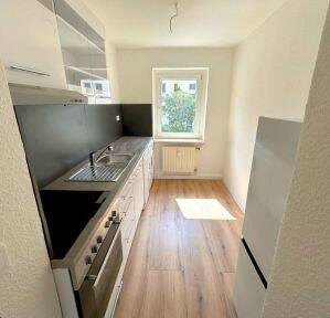 Immobilie in Langenweißbach - Investieren mit Weitblick: Stabil vermietete Einheit in der Alten Schäferei Langenbach - Bild 2