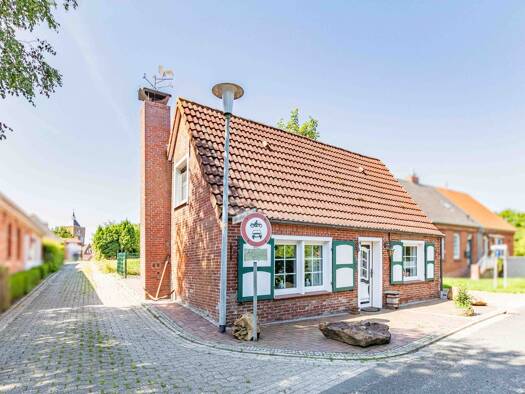 Einfamilienhaus zum Kauf 198.000 € 5 Zimmer 68 m² 339 m² Grundstück Pilsum Krummhörn 26736