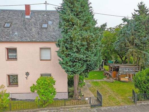 Einfamilienhaus zum Kauf 335.000 € 5 Zimmer 197 m² 1.400 m² Grundstück Macken 56290