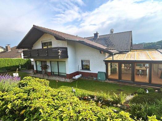 Mehrfamilienhaus zum Kauf 385.000 € 14 Zimmer 240 m² 742 m² Grundstück Heigenbrücken 63869