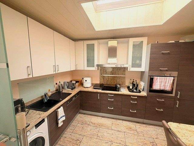 Immobilie in Werne - Eigentumswohnung im attraktiven Bungalowstil mit Atrium, Einbauküche, Garten und Tiefgaragenstellplatz in ruhiger Lage von Werne!!! - Bild 1