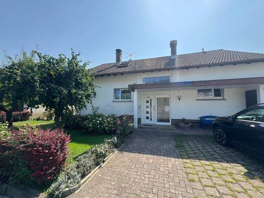 Einfamilienhaus zum Kauf 595.000 € 9 Zimmer 270 m² 718 m² Grundstück Dangstetten Küssaberg 79790