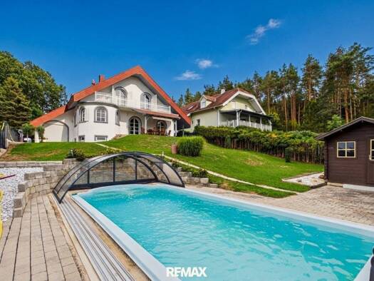 Einfamilienhaus zum Kauf 650.000 € 7,5 Zimmer 225 m² 900 m² Grundstück Oberloisdorf 7451