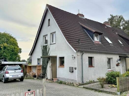 Doppelhaushälfte zum Kauf 210.000 € 4 Zimmer 96 m² 1.071 m² Grundstück Lensahn Lensahn 23738