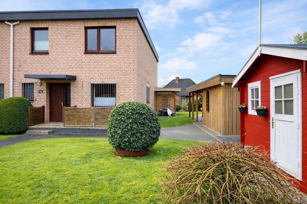 Immobilie in Barmstedt - Gepflegtes Endreihenhaus, ca. 114 m² Wohnfläche, großes Grundstück, Doppelcarport, Garage, Keller - Bild 0