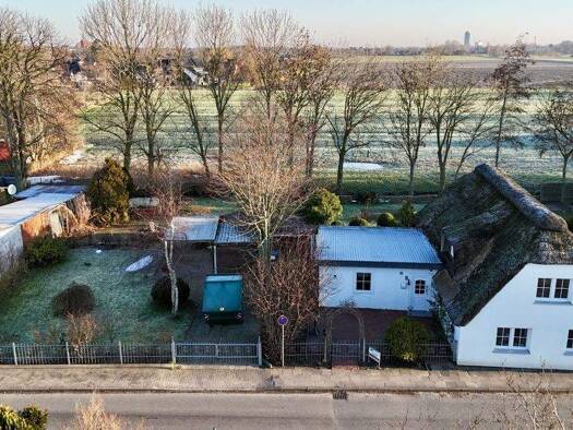 Einfamilienhaus zum Kauf 219.000 € 3 Zimmer 128,8 m² 955 m² Grundstück Süderdeich 25764