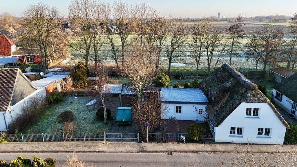 Einfamilienhaus zum Kauf 219.000 € 3 Zimmer 128,8 m² 955 m² Grundstück Süderdeich 25764