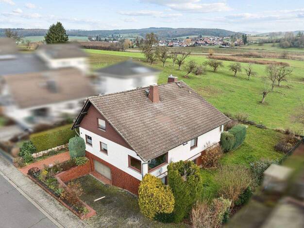 Einfamilienhaus zum Kauf 369.000 € 5 Zimmer 132 m² 768 m² Grundstück Rohrbach Büdingen 63654