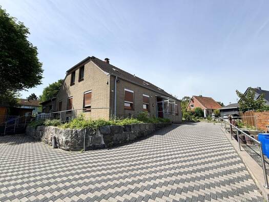 Einfamilienhaus zum Kauf 309.000 € 9 Zimmer 180 m² 1.439 m² Grundstück Heiligenhafen 23774