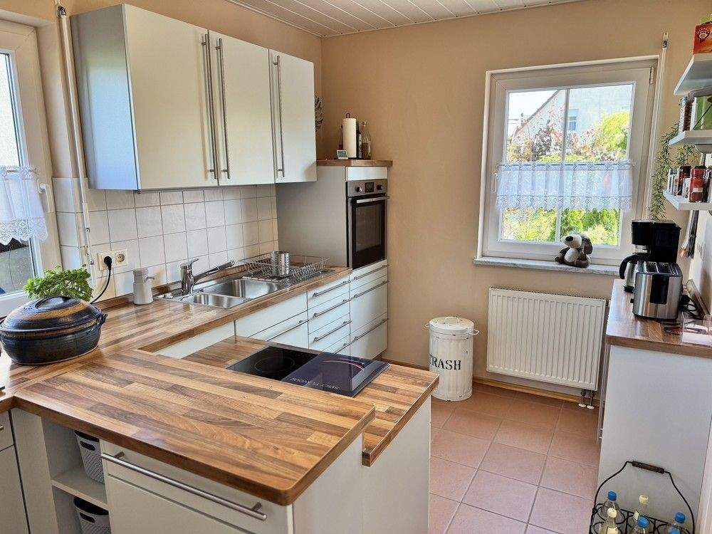 Immobilie in Ellingen - Einfamilienhaus mit Garage und Garten - Bild 3