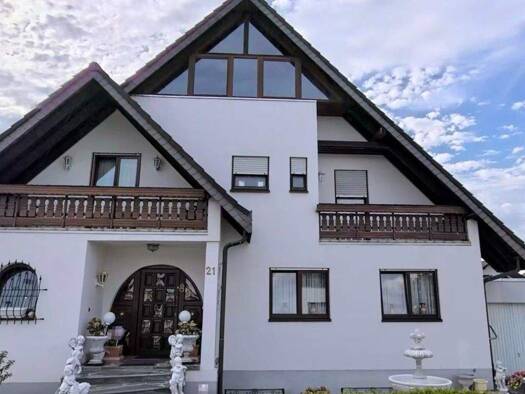 Einfamilienhaus zum Kauf 470.000 € 8 Zimmer 228 m² 573 m² Grundstück Altlußheim 68804