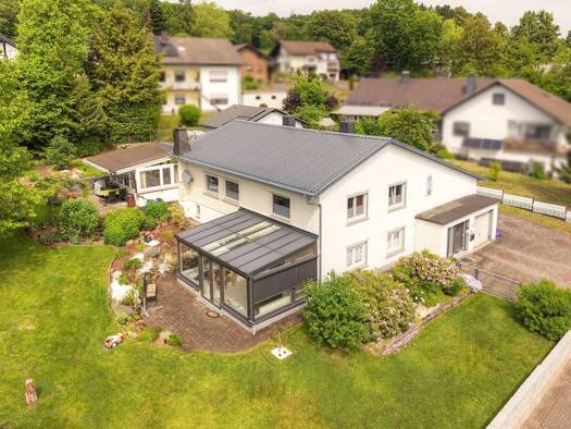 Einfamilienhaus zum Kauf 395.000 € 5 Zimmer 137 m² 1.328 m² Grundstück Rennerod Rennerod 56477