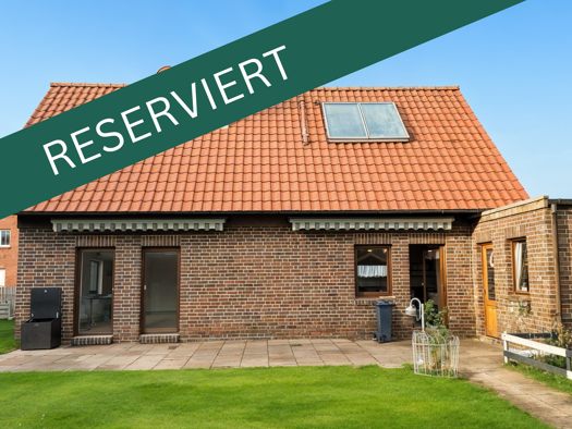 Einfamilienhaus zum Kauf 390.000 € 4 Zimmer 112 m² 559 m² Grundstück Hooksiel Wangerland 26434