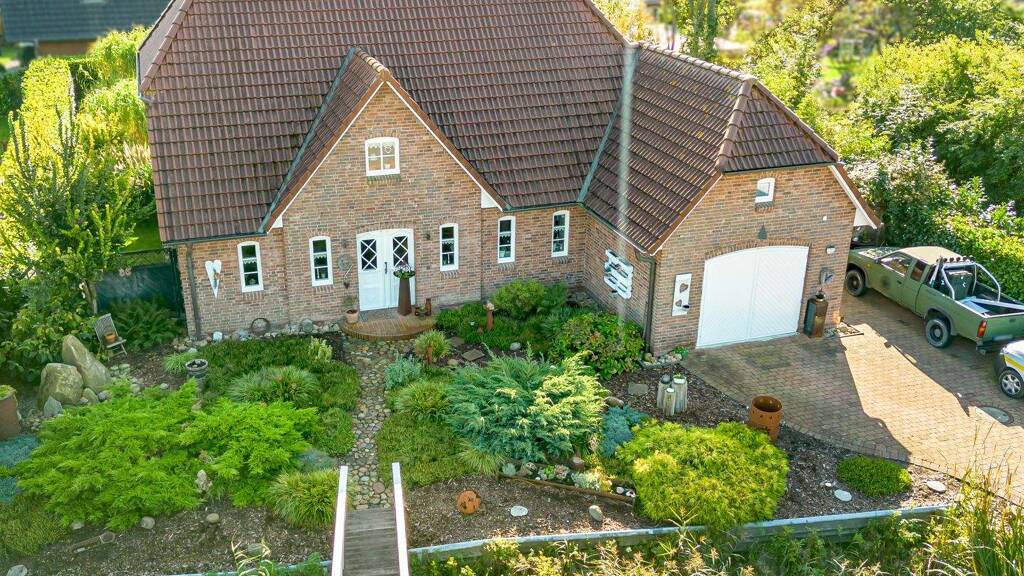 Haus zum Kauf 499.000 € 6 Zimmer 185 m² 1.006 m² Grundstück Oldenswort 25870