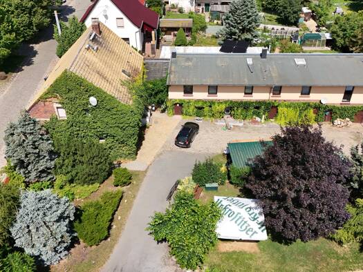 Wohn- und Geschäftshaus zum Kauf als Kapitalanlage geeignet 450.000 € 639 m² 3.250 m² Grundstück Priesitz Bad Schmiedeberg 06905