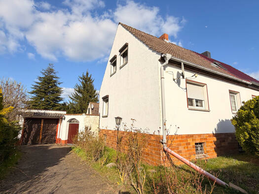 Doppelhaushälfte zum Kauf 99.000 € 4 Zimmer 100 m² 1.163 m² Grundstück Reppichau 06386