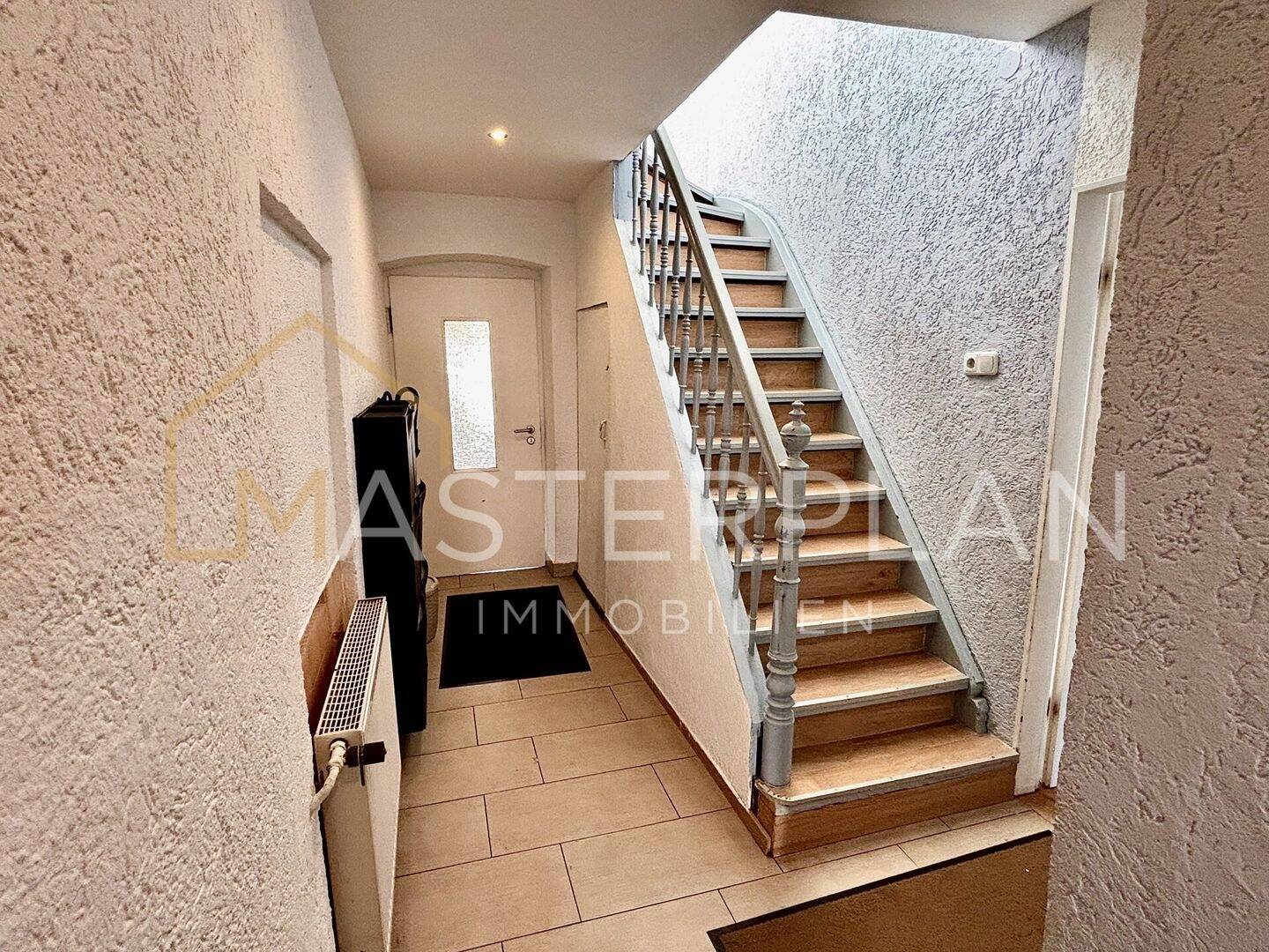 Immobilie in Ensdorf/Saar - Gemütliches Einfamilienhaus mit Garten, Terrasse und Garage in ruhiger Lage - Bild 1