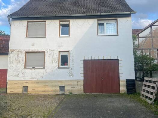 Einfamilienhaus zum Kauf 163.900 € 7 Zimmer 136 m² 933,4 m² Grundstück Rohrbach Ludwigsau 36251