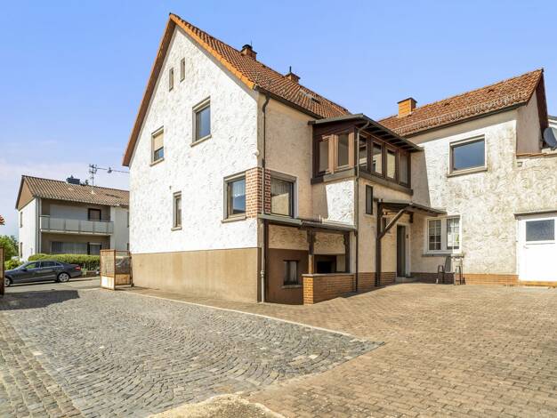 Einfamilienhaus zum Kauf 569.000 € 7 Zimmer 171,6 m² 621 m² Grundstück Zur Kellerheide 5 Langenhain Hofheim am Taunus 65719