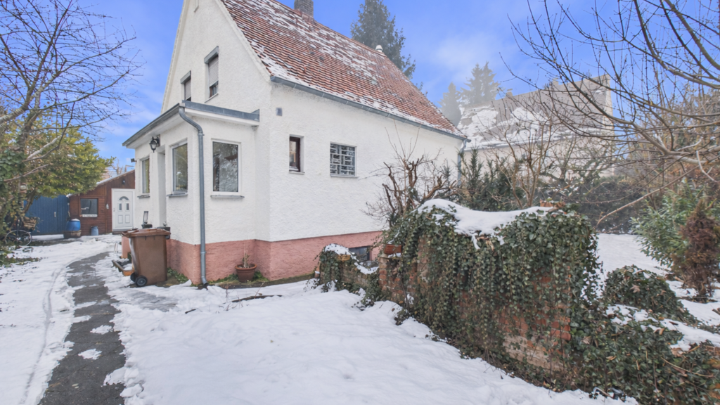Siedlerhaus auf großem Grundstück!
