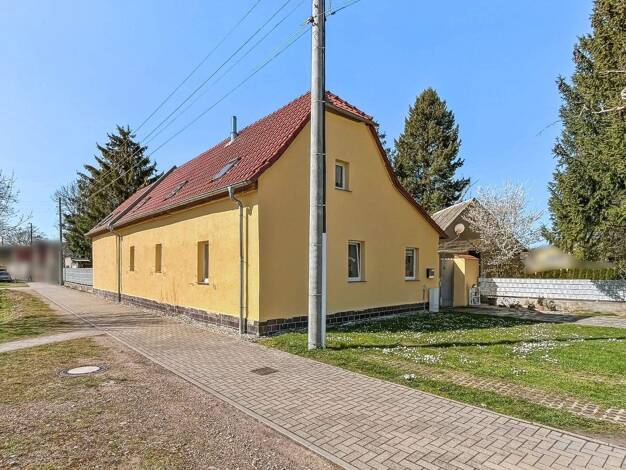 Einfamilienhaus zum Kauf 139.872 € 7 Zimmer 123,6 m² 1.889 m² Grundstück Görzig 06369