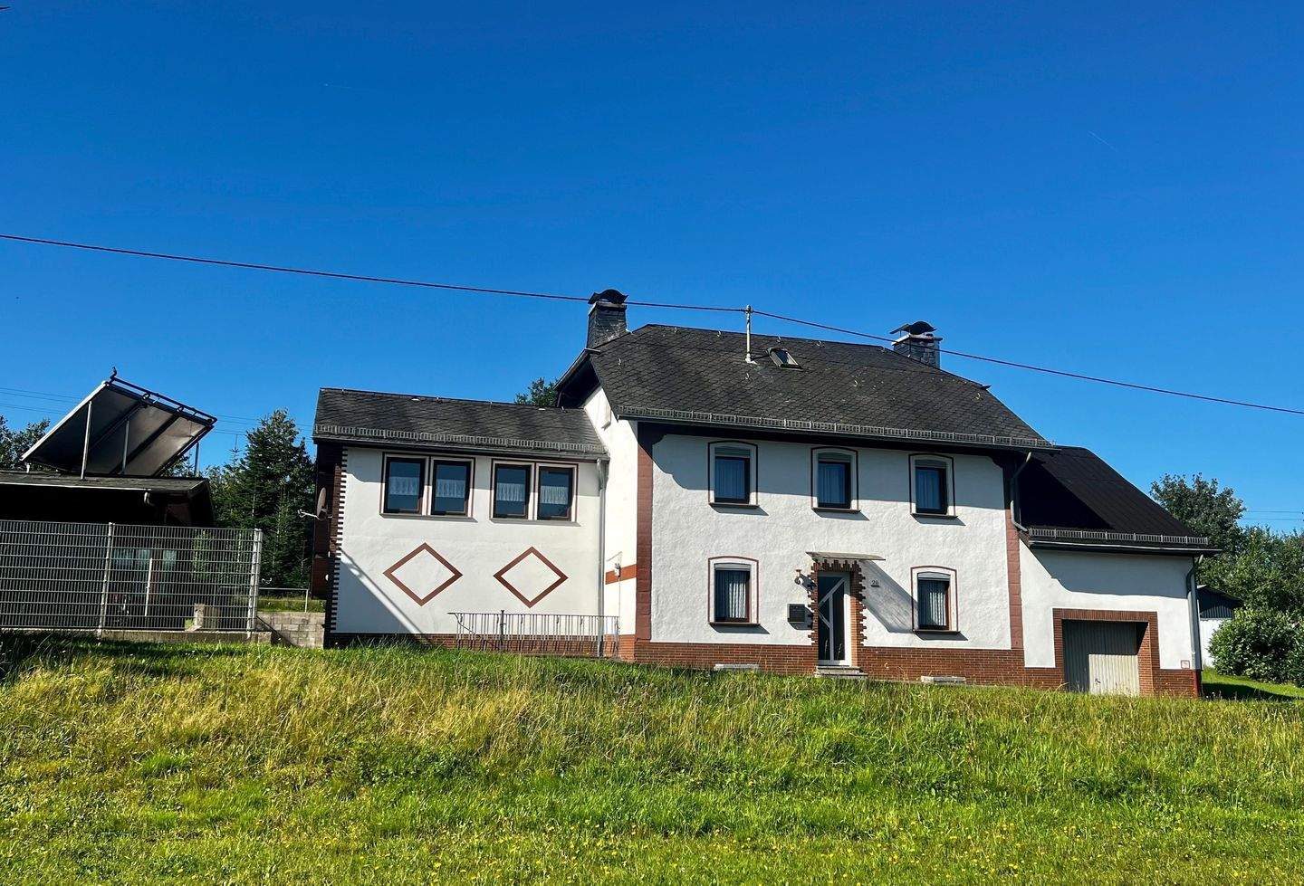 Immobilie in Üttfeld - Gepflegtes Einfamilienhaus mit Nebengebäude und großem Grundstück in idyllischer Lage - Bild 0