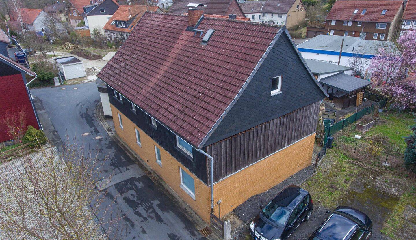 Immobilie in Langelsheim - Einfamilienhaus mit 180 m² Wohnfläche in Langelsheim OT Wolfshagen - Garage, Carport und Werkstatt vorhanden - Bild 2