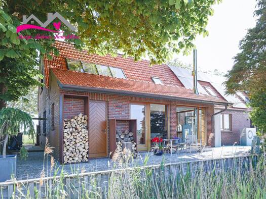 Einfamilienhaus zum Kauf 699.000 € 9 Zimmer 246 m² 812 m² Grundstück Minsen Wangerland 26434