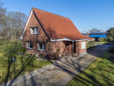 Einfamilienhaus zum Kauf 330.000 € 5 Zimmer 136 m² 1.260 m² Grundstück Wacken 25596