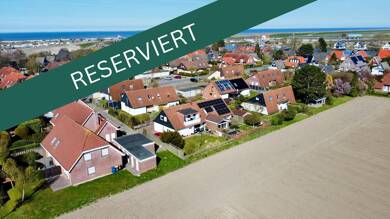 Doppelhaushälfte zum Kauf 280.000 € 5 Zimmer 110 m² 345 m² Grundstück Carolinensiel Wittmund 26409
