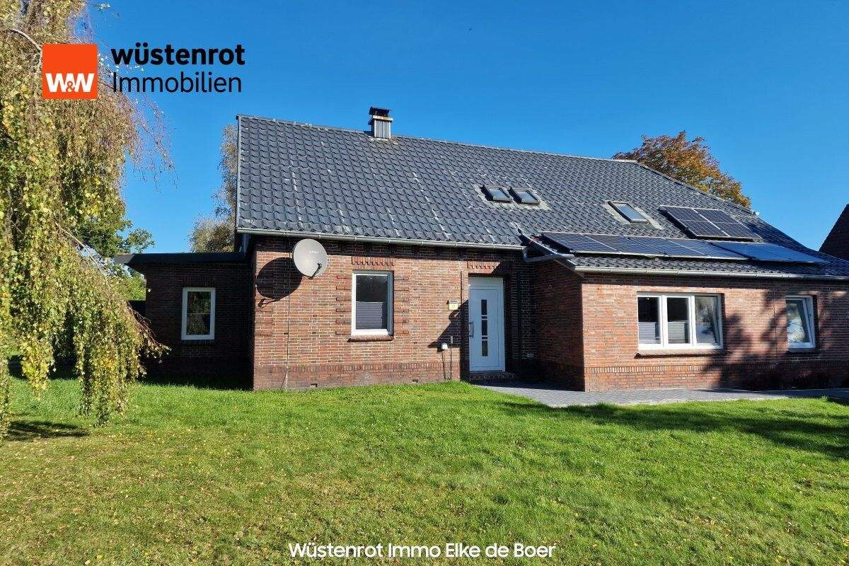 Immobilie in Großefehn - Modernisiertes Landhaus mit Einliegerwohnung in schönen Großefehn - Bild 1