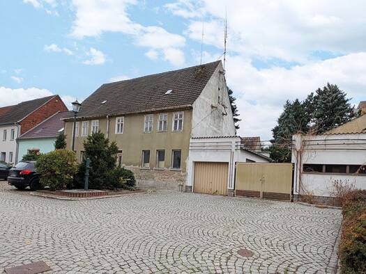 Einfamilienhaus zum Kauf 25.000 € 6 Zimmer 180 m² 1.544 m² Grundstück Grüne Gasse 10 Gräfenhainichen Gräfenhainichen 06773