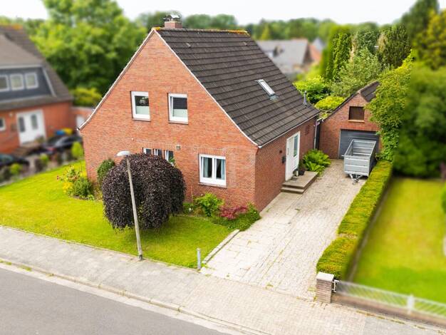 Einfamilienhaus zum Kauf 290.000 € 5 Zimmer 120 m² 584 m² Grundstück Larrelt Emden 26723