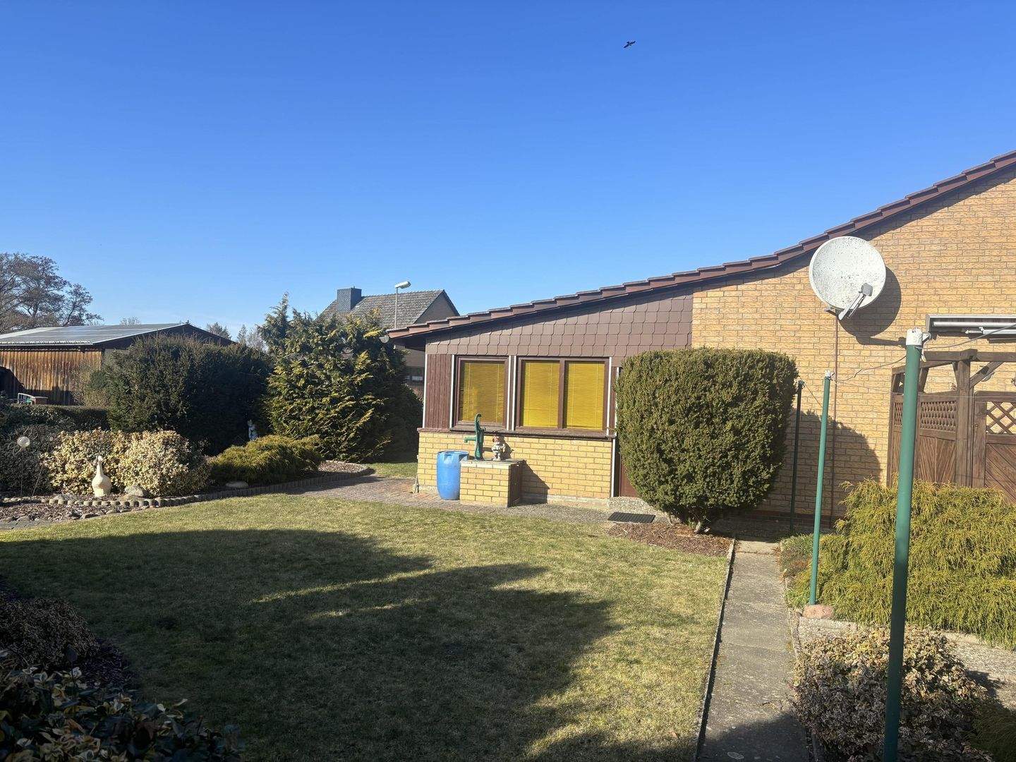 Immobilie in Wustrow - Bungalow zu ebener Erde mit Garage und Wintergarten - Bild 4